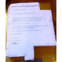 An innovative way to resign. This customer sent their registration letter on a cake