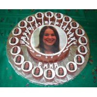 An impressive array of photo cupcakes around a photo cake