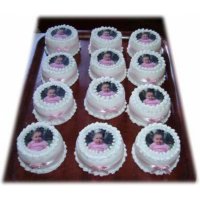 Decorative fairy cakes finished with a dozen cupcake toppers