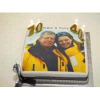 A personalised photo cake to celebrate a 70th and 40th birthday