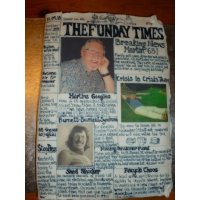 Newspaper topper for a 65th Birthday cake