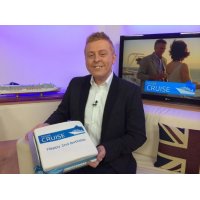 Happy 2nd Birthday to Inside Cruise celebrating on air with a cake