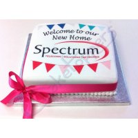 Celebrating a new home with a cake for Spectrum