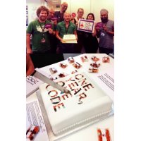 Mitie logo cakes celebrating their code of conduct's first anniversary