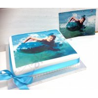 A customer's photo cake with the original photograph